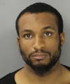 Lonnell Marquis Chestnut, pictured above, was arrested recently for passing fake bills in Plymouth.