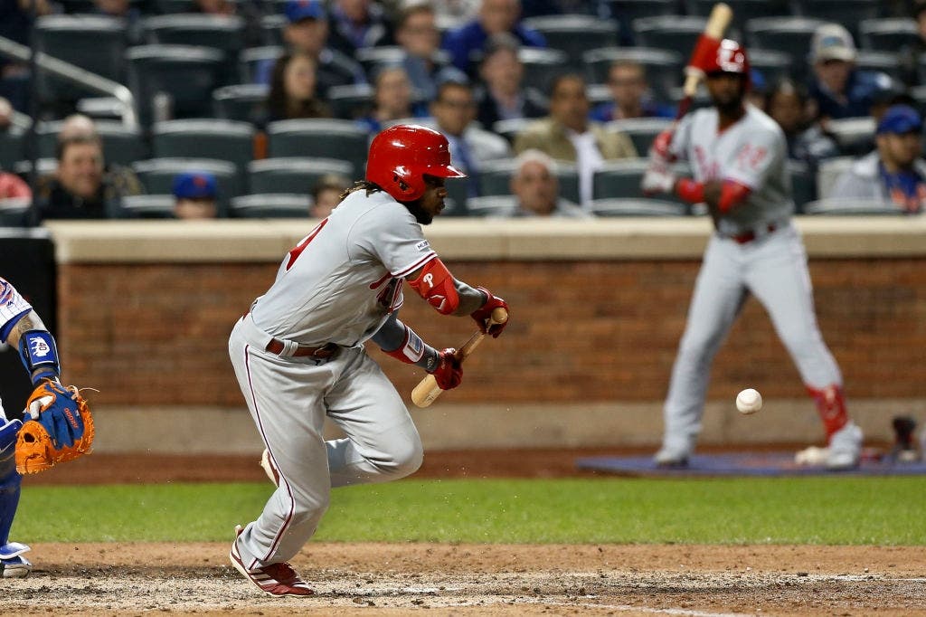 Roman Quinn, laying down a perfect RBI bunt single here against the Mets, is the latest Phillie to hit the injured list.