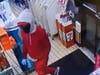 A suspect in the 7-Eleven robbery is pictured above.