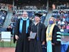 Jason Bartosiak received the Distinguished Service Award from Dean of Student Services Tim St. James and CEO Dr. Michelle Coach.
