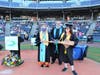 Alicia St. Peter received the Broken Paddle Award from Dean of Student Services Tim St. James and CEO Dr. Michelle Coach. 
