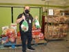 Asnuntuck’s Food Pantry was happy to be able to distribute holiday fixings to the Asnuntuck community in celebration of the Thanksgiving Day holiday. AmeriCorps Member Ryan Russin is seen holding the turkeys in Asnuntuck's Pantry. 
