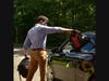 State Representative Matt Blumenthal, District 147, helps load
backpacks into the cars of participants at the 2020 Back to School Shop event.