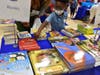A participant finds just the right book.