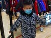 Showing off his new coat at the 2022 Back to School Shop event. 
