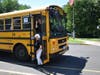 Volunteers on their way to work at the ninth annual Back to School Shop event.