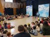 Back to School Shop Co-Founder, Meryl Japha, speaks to nursery children about the importance of their gifts. 