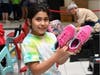 Shopper shows off her sneaker selection.
