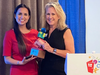Museum President and CEO Andrea Ingram presents The Great Friend to Kids Award to the Deputy Director of Public Engagement, Andrea Vallejo, who accepted the award on behalf of the Governor J.B. Prtizker.