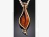 "Amboyna Burl & Diamond Pendant" by jeweler Harry Mackie
