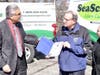 East Providence Mayor Bob DaSilva with Dr. Jim Wilkinson, SeaScape president; Catherine Giusti, SeaScape director of administration