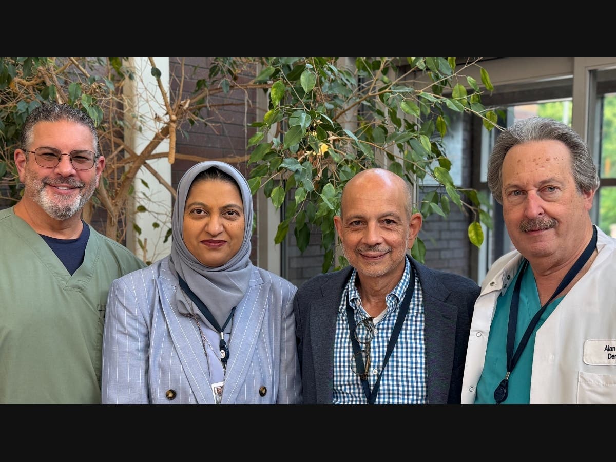 Dr. Naz Khan (second from left) is welcomed by her colleagues at Long Island Select Healthcare (left to right): Steve Asofsky, MA, CCC-SLP/TSHH - Rehab Supervisor, Dr. Spiro Theoharakis, MD - Lead Psychiatrist, and Dr. Alan Winik, DDS - Dental Director