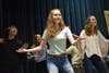 Cat Hyers and fellow ensemble members rehearse the finale in preparation for Avon High School's production of "Pippin."