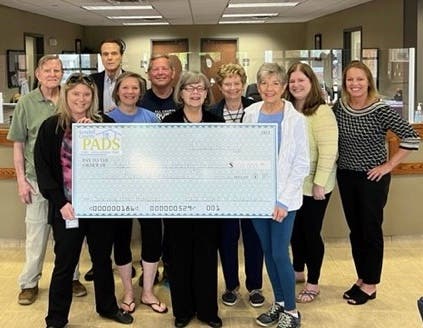 Depicted with PADS check at the Kendall County Health and Human Services building in Yorkville are Richard Velders, Melissa Creamer, Tom Siebert, Karen and Steve Allred, Kathy Farren, Sandy Lindblom, Anne Engelhardt, Sara Poniatowski, RaeAnn VanGundy.