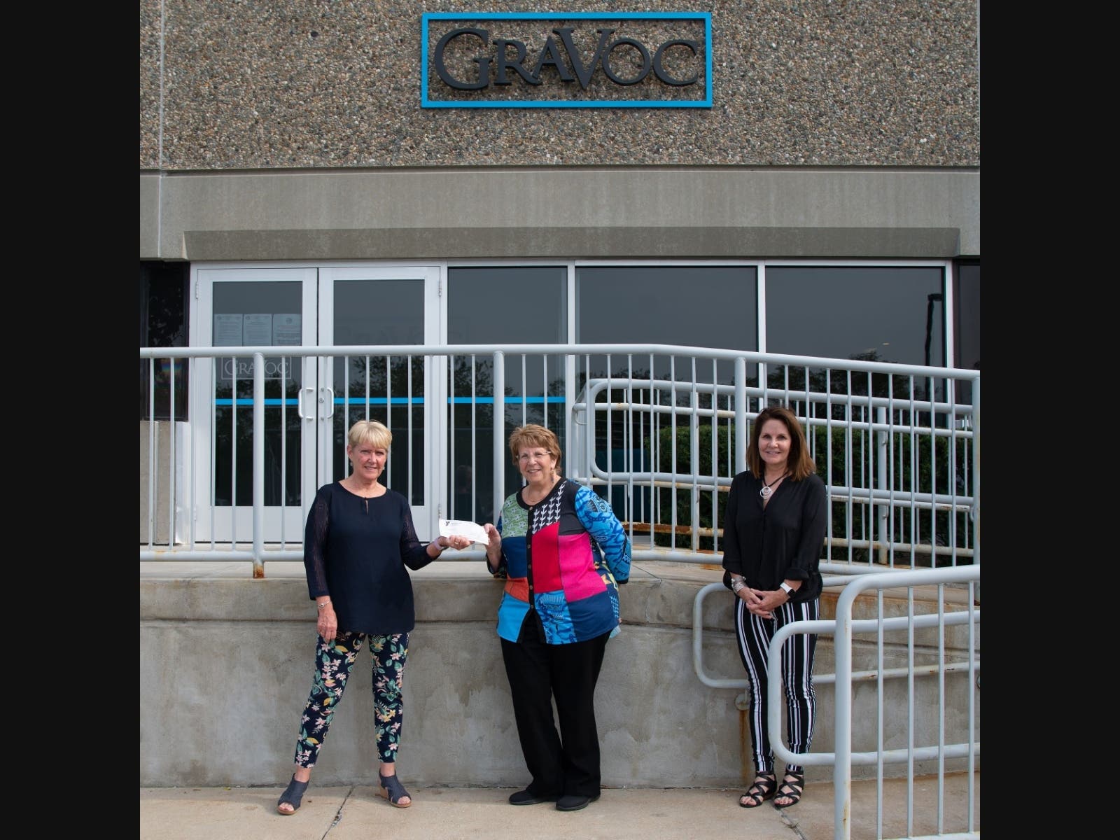 Grand Prize Raffle winner Nancy Sherman with Cathy Gravel of GraVoc Associates, Inc. and Kathleen Walsh, President and CEO of the YMCA of Metro North.