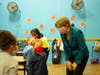Attorney General Maura Healey talks with Y Academy child care center.