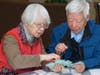 At a Heart to Heart® Café, a trained facilitator asks participants to select their respective top 12 cards from the deck; selecting three cards from each suit.