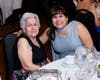 Metropolitan Family Services DuPage Executive Director Rita Lopez Brosnan and Imelda Lopez