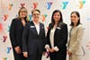 The Community YMCA and the YMCA of Western Monmouth County leadership celebrate the merger of the two YMCAs.
