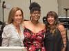 Event co-chairpersons Irene Hall (left) and Lauren Berke (far right) thank Onestie Jackson for sharing an inspiring story of the Y’s impact on her life.