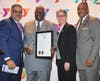 Wayne Boatwright, Hackensack Meridian Health’s vice president of Diversity and Inclusion, receives the inaugural Dr. King Human Dignity Award and a state proclamation at the annual YMCA MLK commemorative breakfast.