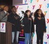 Local students lead the pledge of allegiance at the Y's annual MLK commemorative breakfast.