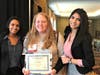 Ashley Biddle (center), the Y's Civic Engagement Program Coordinator, celebrates being honored with the Gail C. Jochen YMCA Values Award at the Model UN conference with delegation officers Alessa Alex and Skriti Nakkeeran from Freehold High School.