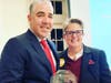 VNA President and CEO Dr. Steven Landers presents the Community Partner Award to the YMCA of Greater Monmouth County President and CEO Laurie Goganzer. 
