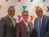  Event Chairman Michael Wright and Y President and CEO Laurie Goganzer with keynote speaker the Rev. Dale Caldwell. 
