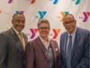 Event Chairman Michael Wright and Y President and CEO Laurie Goganzer with keynote speaker the Rev. Dale Caldwell.
