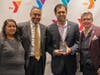 YMCA Social Responsibility Award honoree Senator Vin Gopal with Y board members Itzel Perez, Michael Wright and President and CEO Laurie Goganzer.