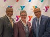 Event Chairman Michael Wright and Y President and CEO Laurie Goganzer with keynote speaker the Rev. Dale Caldwell