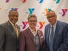 Event Chairman Michael Wright and Y President and CEO Laurie Goganzer with keynote speaker the Rev. Dale Caldwell.
