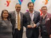 YMCA Social Responsibility Award honoree Senator Vin Gopal with Y board members Itzel Perez, Michael Wright and President and CEO Laurie Goganzer. 