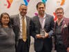 YMCA Social Responsibility Award honoree Senator Vin Gopal with Y board members Itzel Perez, Michael Wright and President and CEO Laurie Gog