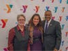 Featured speaker at the YMCA’s Dr. King celebration Maysa Akbar, Ph.D., (center) with Y President and CEO Laurie Goganzer and Chief Volunteer Officer Michael A. Wright. 
