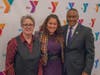 Featured speaker at the YMCA’s Dr. King celebration Maysa Akbar, Ph.D., (center) with Y President and CEO Laurie Goganzer and Chief Volunteer Officer Michael A. Wright. 
 