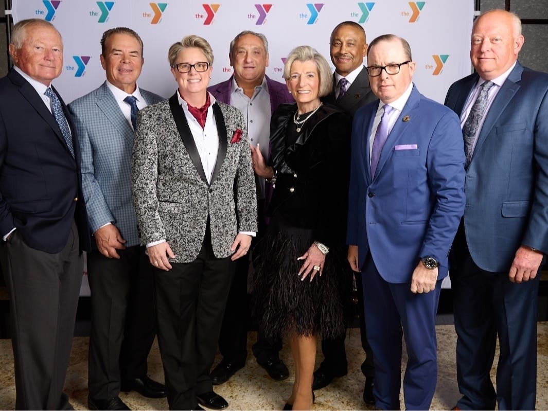 Y CEO Laurie Goganzer (3rd left) and Chief Volunteer Officer Michael A. Wright (3rd right) honored supporters at the Y's 150th anniversary gala: Bruce Lakefield, Peter McCarthy, Danny Matarese, Carol Stillwell, Anthony Altobelli, of PNC, & Chris Mosley.
