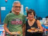 Neighbors from the local community enjoy food and free events at Welcoming Week.