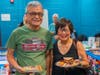 Neighbors from the local community enjoy food and free events at Welcoming Week.