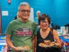 Neighbors from the local community enjoy food and free events at Welcoming Week.