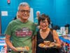 Neighbors from the local community enjoy food and free events at Welcoming Week.
