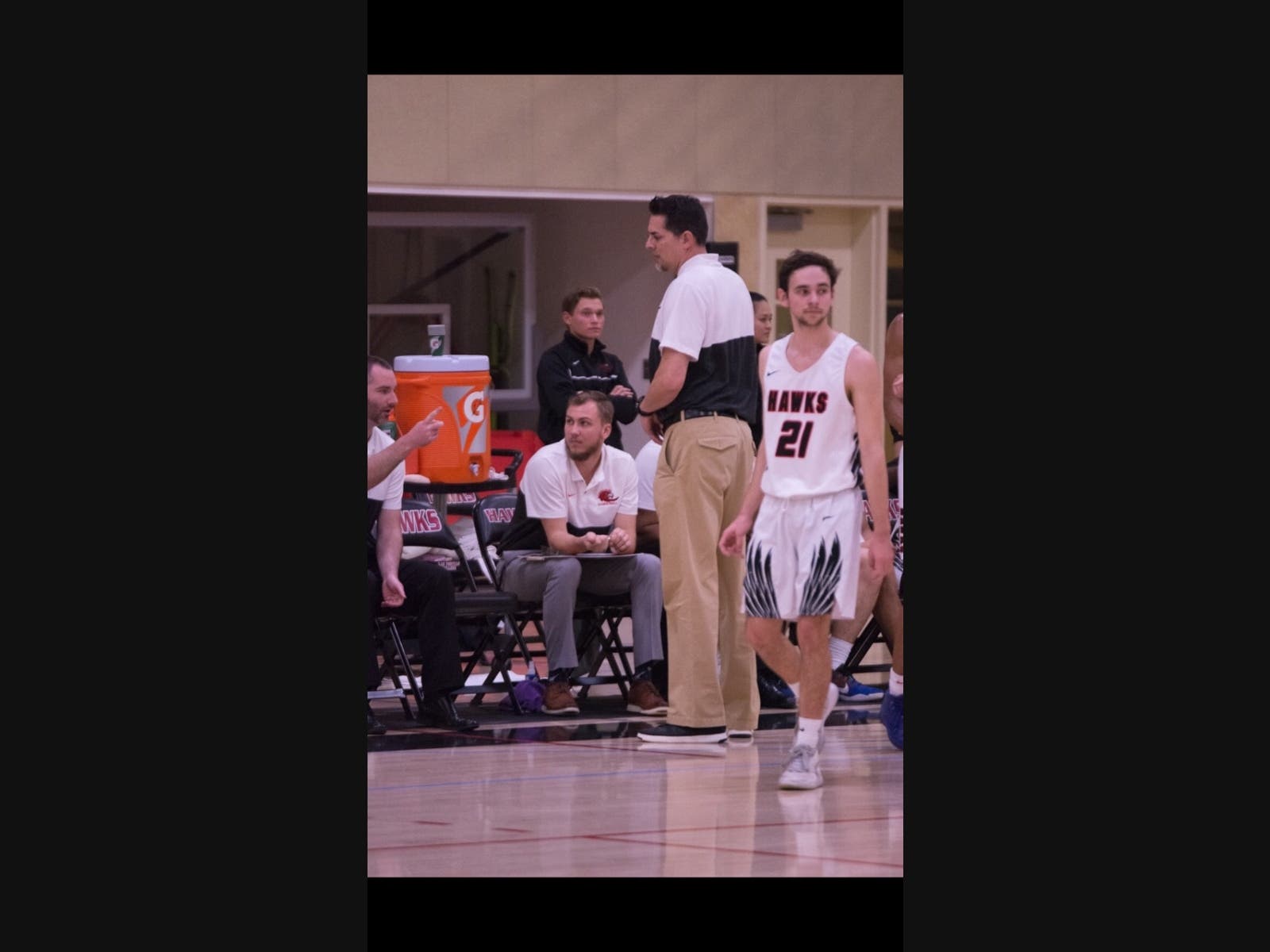 Spencer Wood coaches from the bench