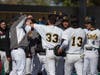 Alonzo Guijarro and teammates gather in celebration