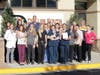 A group photo of Dr. Drew Luce & Mrs. Aimee Luce with some of the Aldie Veterinary Hospital staff.   From Left to Right: Dr. Kelli Rhymes, Dr. Courtney Conroy, Sam Cate, Mrs. Aimee Luce, Laurel Walker, Ambershea Brown, Dr. Drew Luce, Dr. Riley Shugg, Jenn