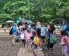 Kateri Day Campers enter the new Collier Inclusive Playground