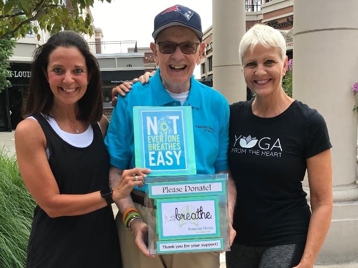 Mal Doyle (center), West Hartford resident and Pulmonary Fibrosis Foundation volunteer Ambassador, is joined by his daughter, Valerie Hansen (left), and Diane Couture (right), yoga teacher and owner of Yoga From the Heart studio. 