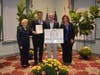 Salvatore Benvenga receives the award for Green Practices in Beautification for Energy House LLC.