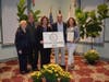 Laurent & Margaret Janowsky, owners of Del Ray Café, receive the award for Commercial Beautification.