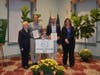 Brett Egusa and his son accept the Community Beautification award on behalf of the Taylor Run Citizen’s Association and Ivy Hill Neighborhood.